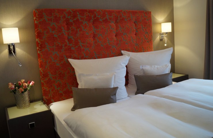 Schlafbereich des exklusiven Appartements mit Dusche